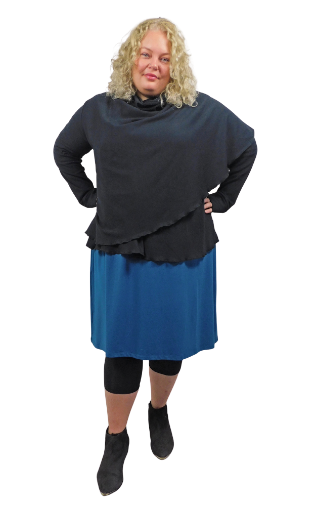 Person wearing a black top and blue skirt on a white background
