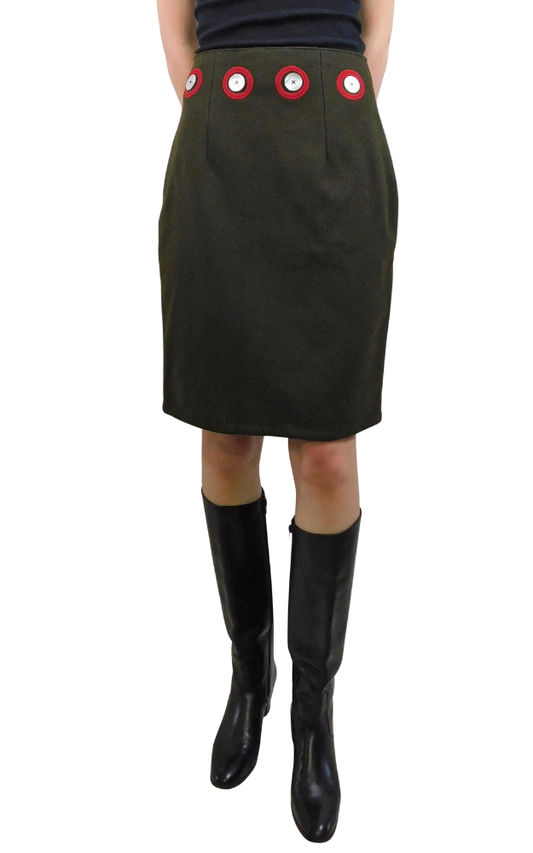 Green skirt with red decorative elements at waist