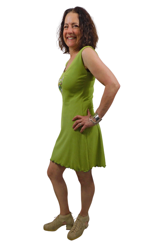 Woman wearing a green dress on a white background