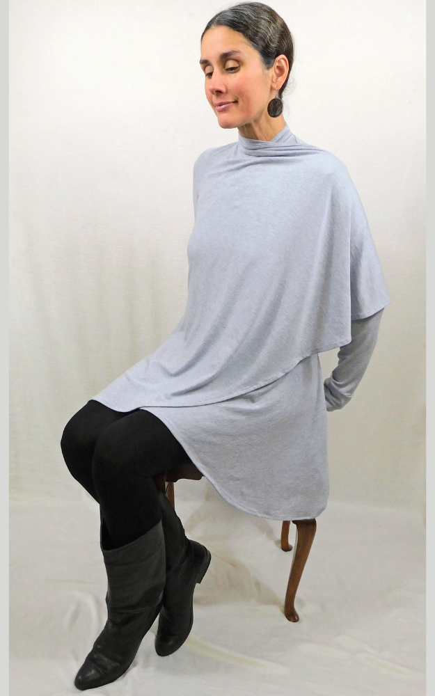 Woman sitting on stool grey wool cardigan with long wrap around shoulder
