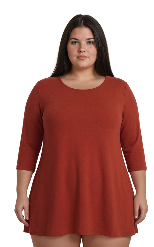 Woman wearing a rust-colored dress on a white background