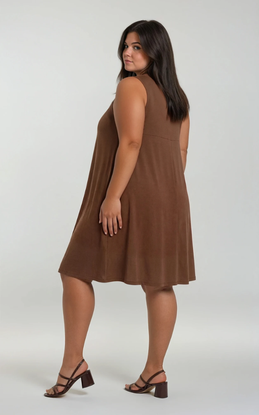 Woman wearing a brown sleeveless dress on a white background