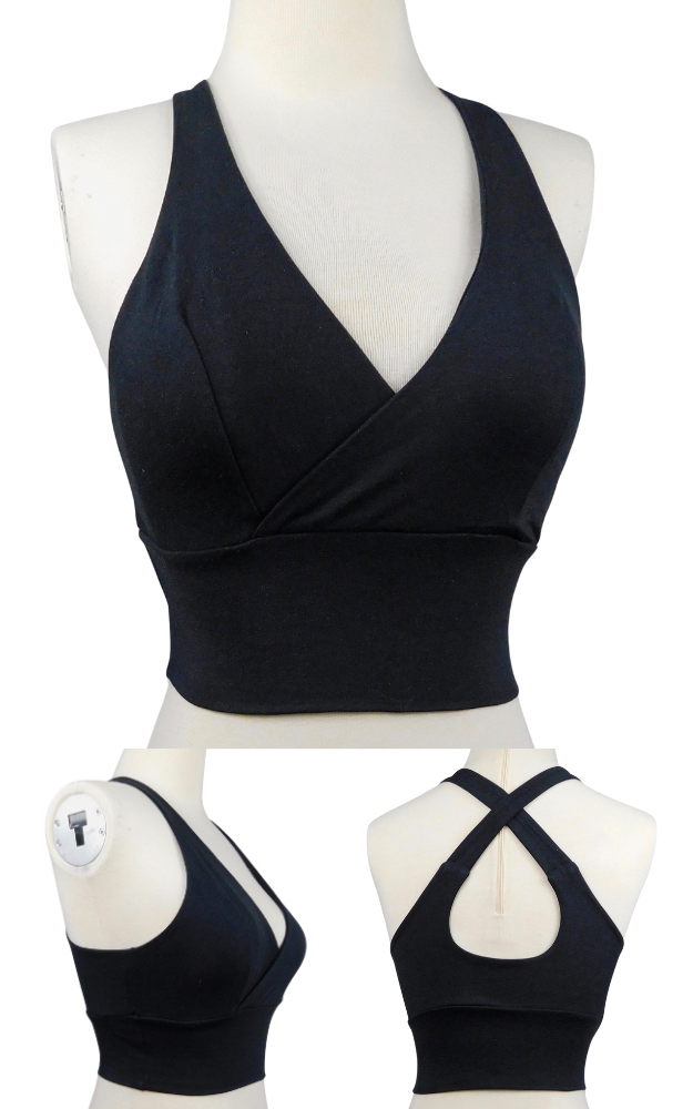 Black bra top on a mannequin with additional black tops displayed below.