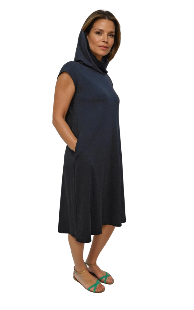 Woman wearing a black dress with a hood on a white background