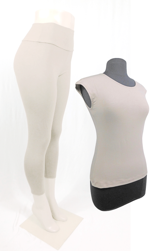 Beige sleeveless top and leggings on a mannequin against a white background