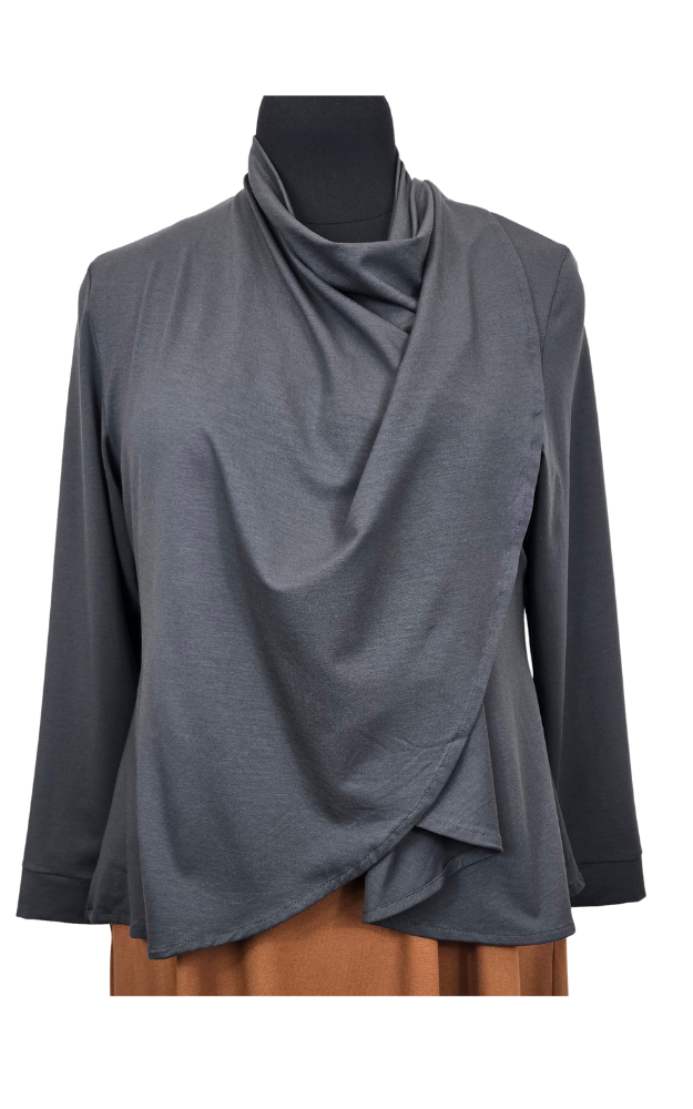 Gray layered cardigan over a brown dress on a mannequin against a white background