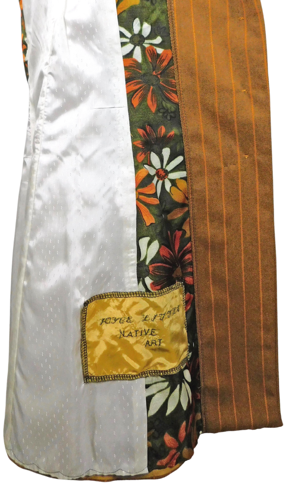 Traditional garment showing white and floral lining and a visible brand label on a white background