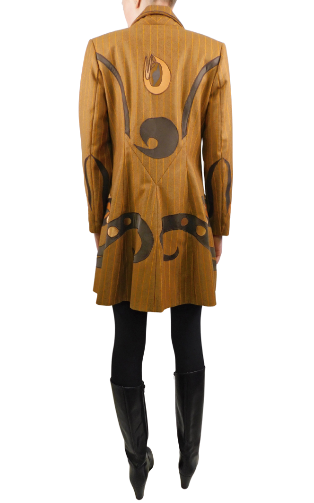 Golden brown coat back view with decorative patterns on a white background
