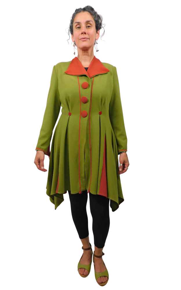 Woman wearing a green and red coat on a white background