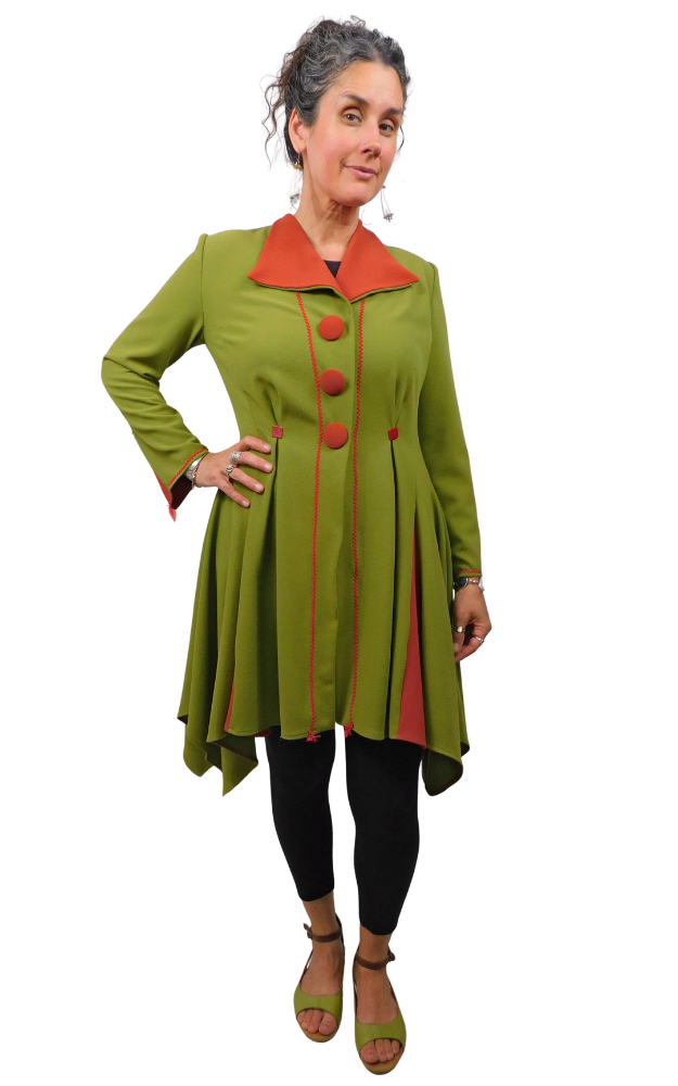 Woman wearing a green coat with red accents on a white background