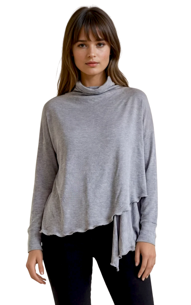 Woman wearing a gray wrap sweater with a white background