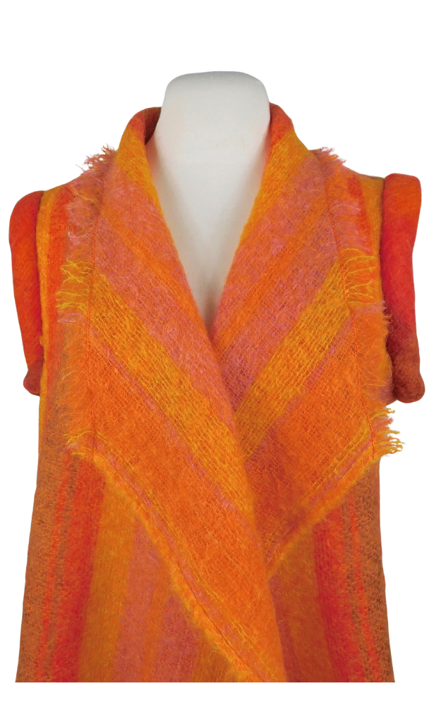 Mannequin wearing a vibrant orange and red &  pink striped vest on a white background