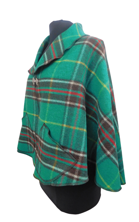 Green tartan plaid cape on a white background