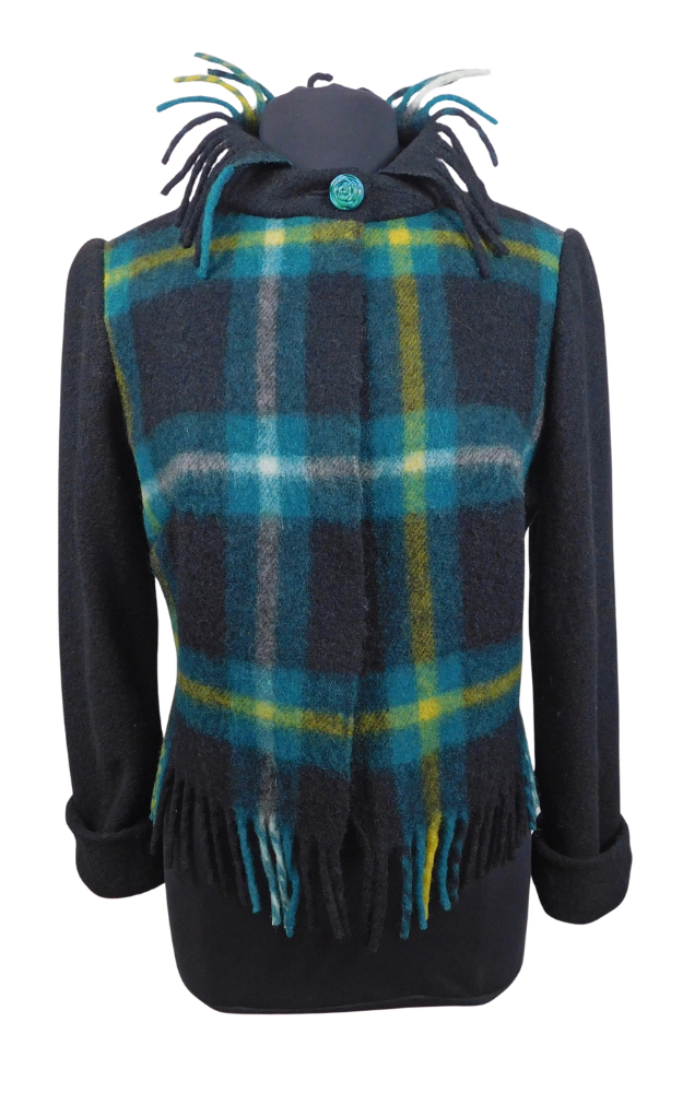 Plaid jacket fringes and black cuffed sleeves with fringes on a plain background.