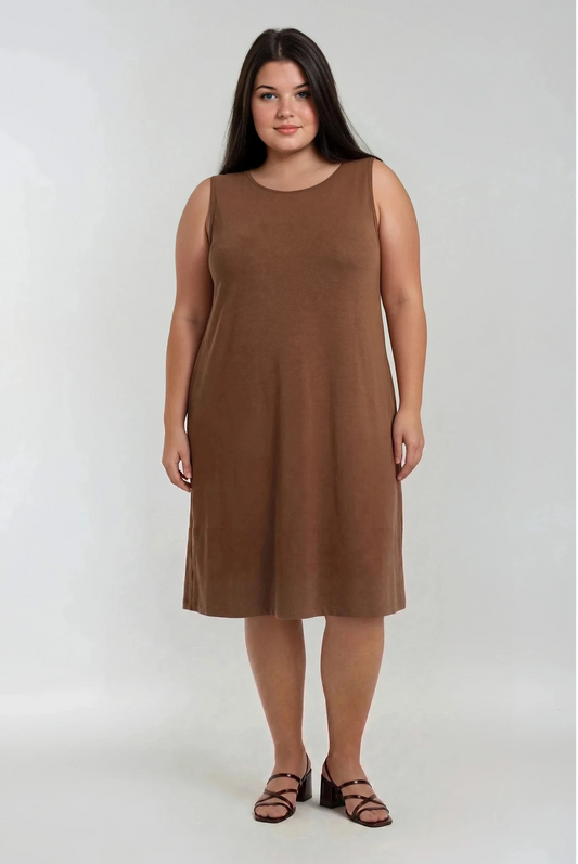 Woman wearing a brown sleeveless dress on a white background