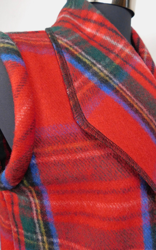 Close-up of a red plaid fabric on a mannequin