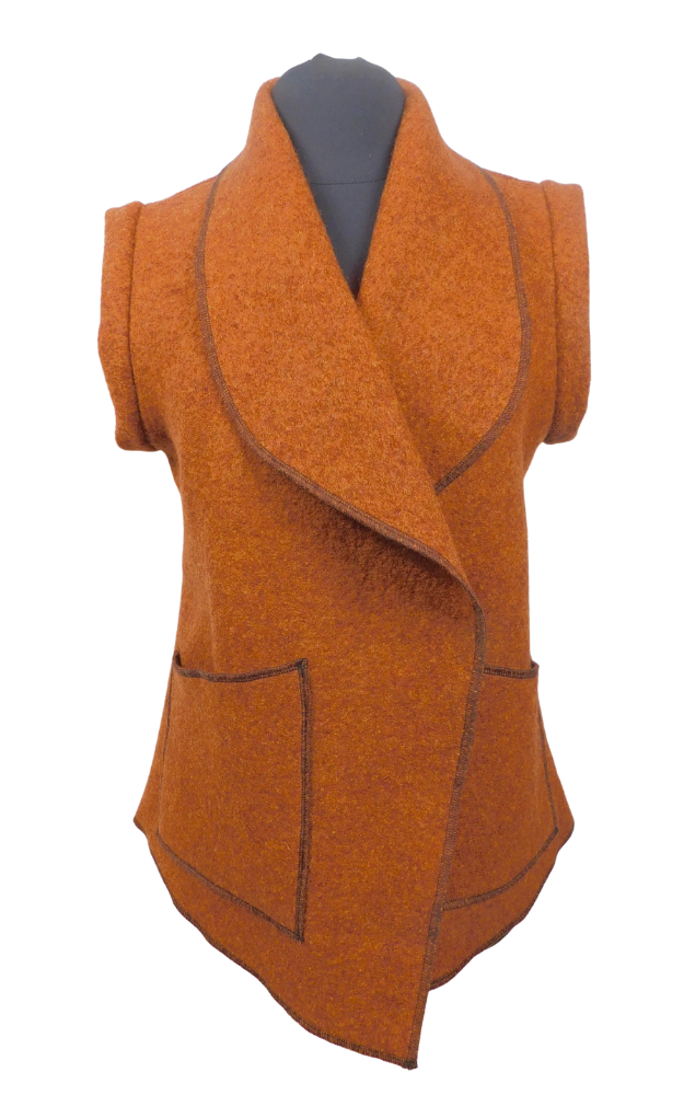 A rust coloured boiled wool vest with patch pockets on a dummy