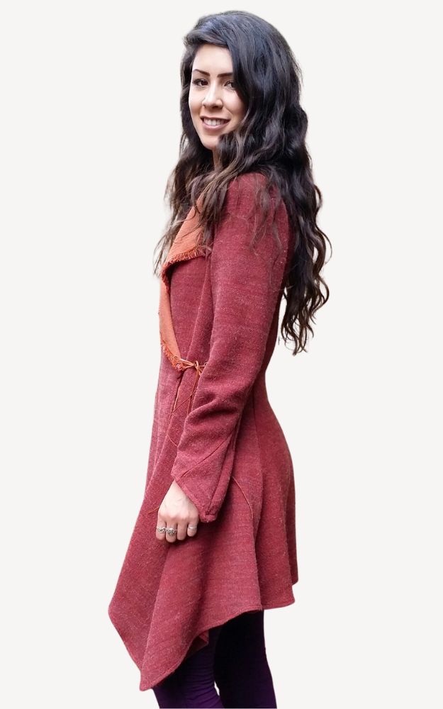 Woman wearing a burgundy coat on a white background
