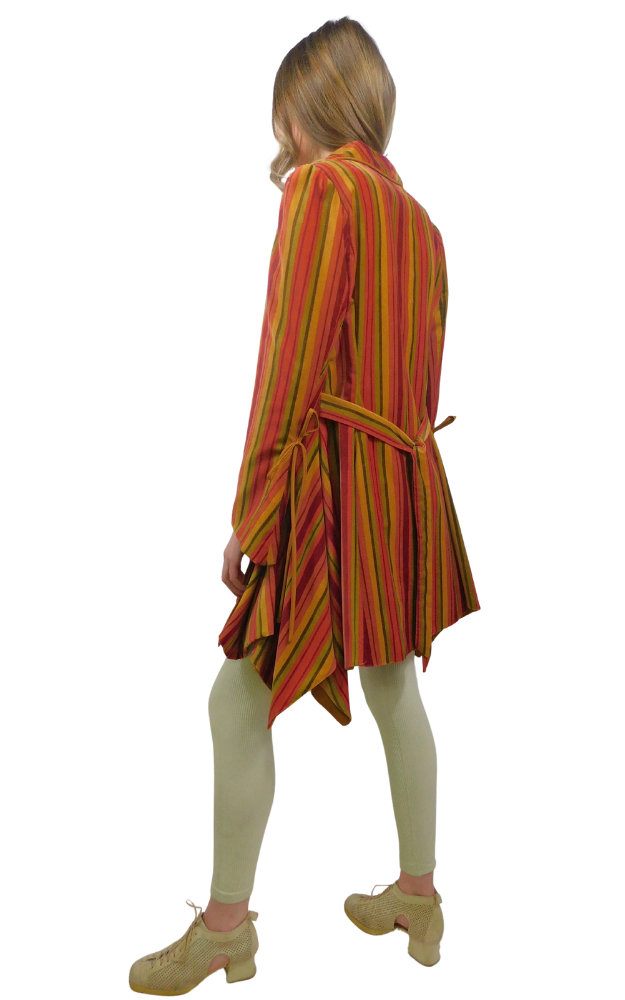 Woman wearing a colorful striped coat back view with a white background