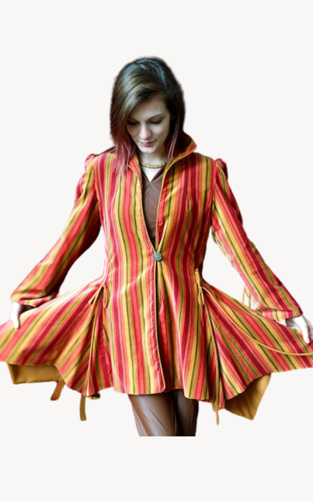 Multi coloured striped coat on woman against a white background